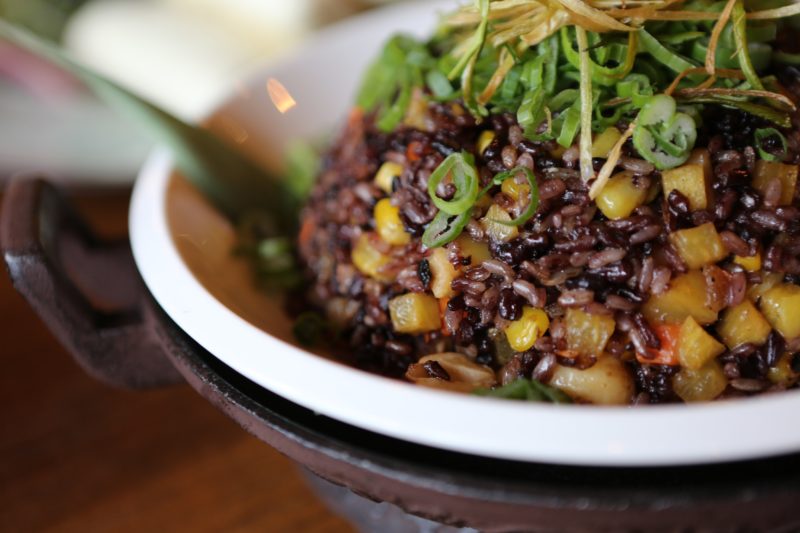 Rice and beans recipe on a plate with garnishes