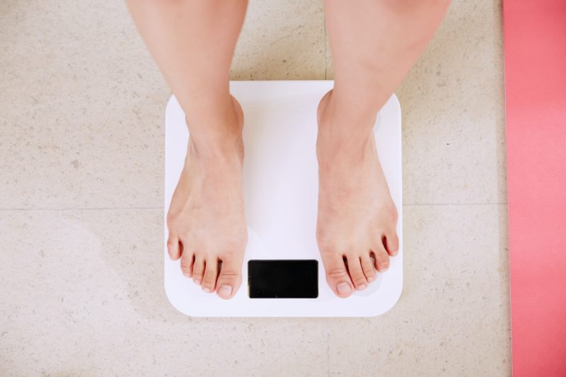 personal chef services weight loss feet standing on a scale
