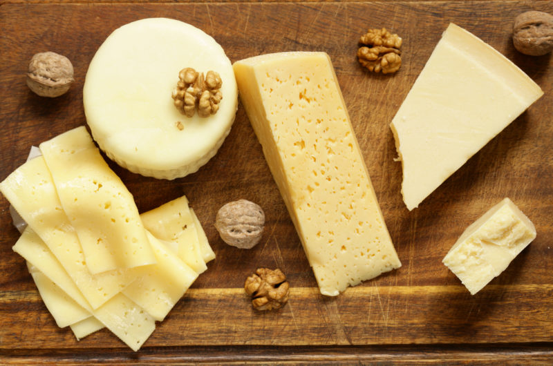 Cheeses are a must-have on your Super Bowl charcuterie board.